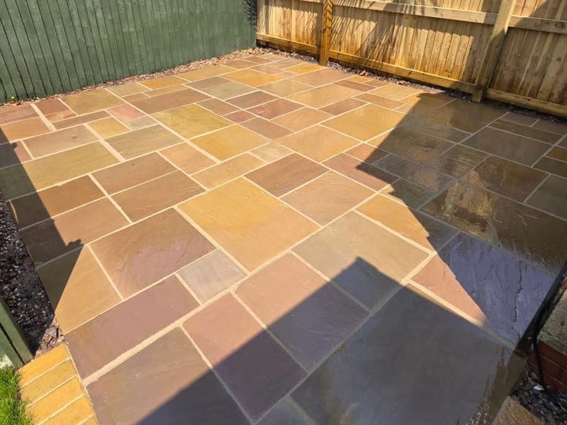 Sandstone patio cleaned back to bare stone